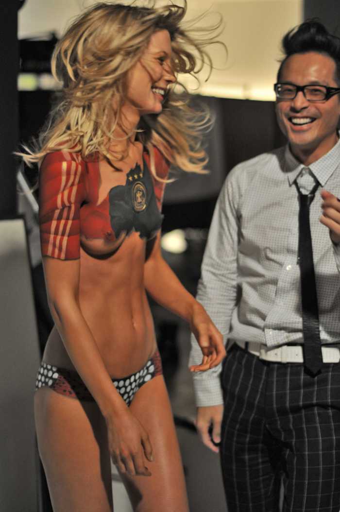 Sarah Brandner (with photographer Yu Tsai) in body paint, SI Swimsuit 2010